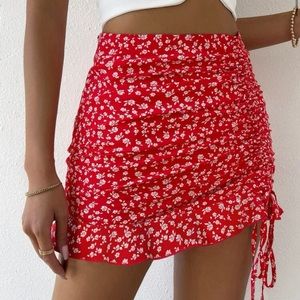 Red skirt brand new with flower design